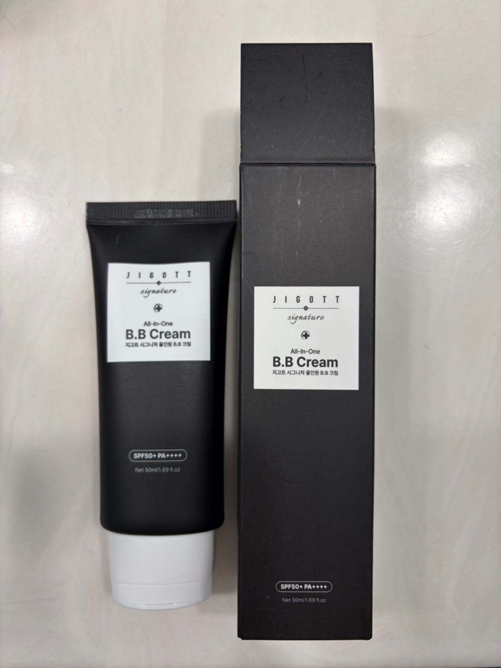Jigott Signature All-In-One B.B Cream - Black & White Packaging